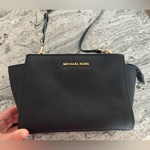 Michael Kors black leather purse with duster bag